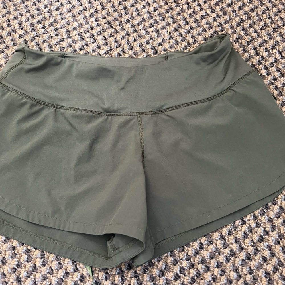 Green vuori running shorts